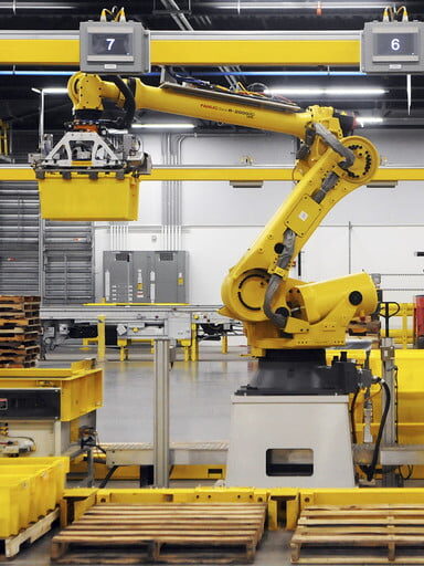 A machine in a factory Description automatically generated with low confidence