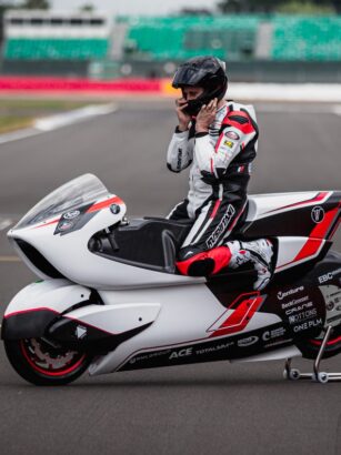 A person on a motorcycle Description automatically generated with low confidence