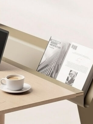 A computer and a cup of coffee on a table Description automatically generated with low confidence