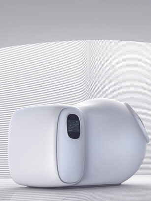 A computer mouse on a white surface Description automatically generated with medium confidence