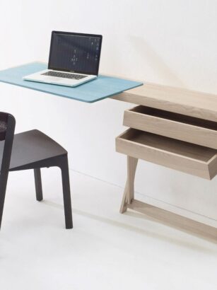 A computer on a table Description automatically generated with medium confidence