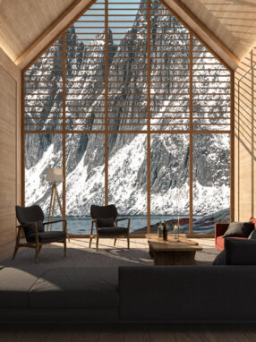 A living room with a large window Description automatically generated with low confidence