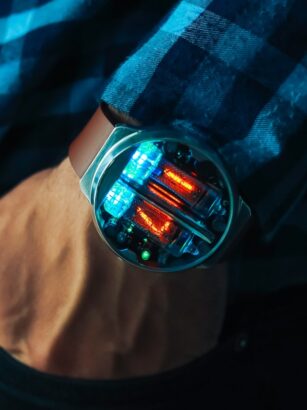 A person holding a bottle Description automatically generated with medium confidence