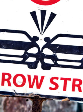 A picture containing text, sign, outdoor Description automatically generated