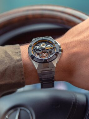 A person wearing a watch Description automatically generated with low confidence