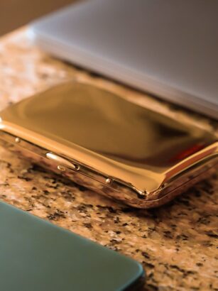 A picture containing indoor, computer, accessory, square Description automatically generated